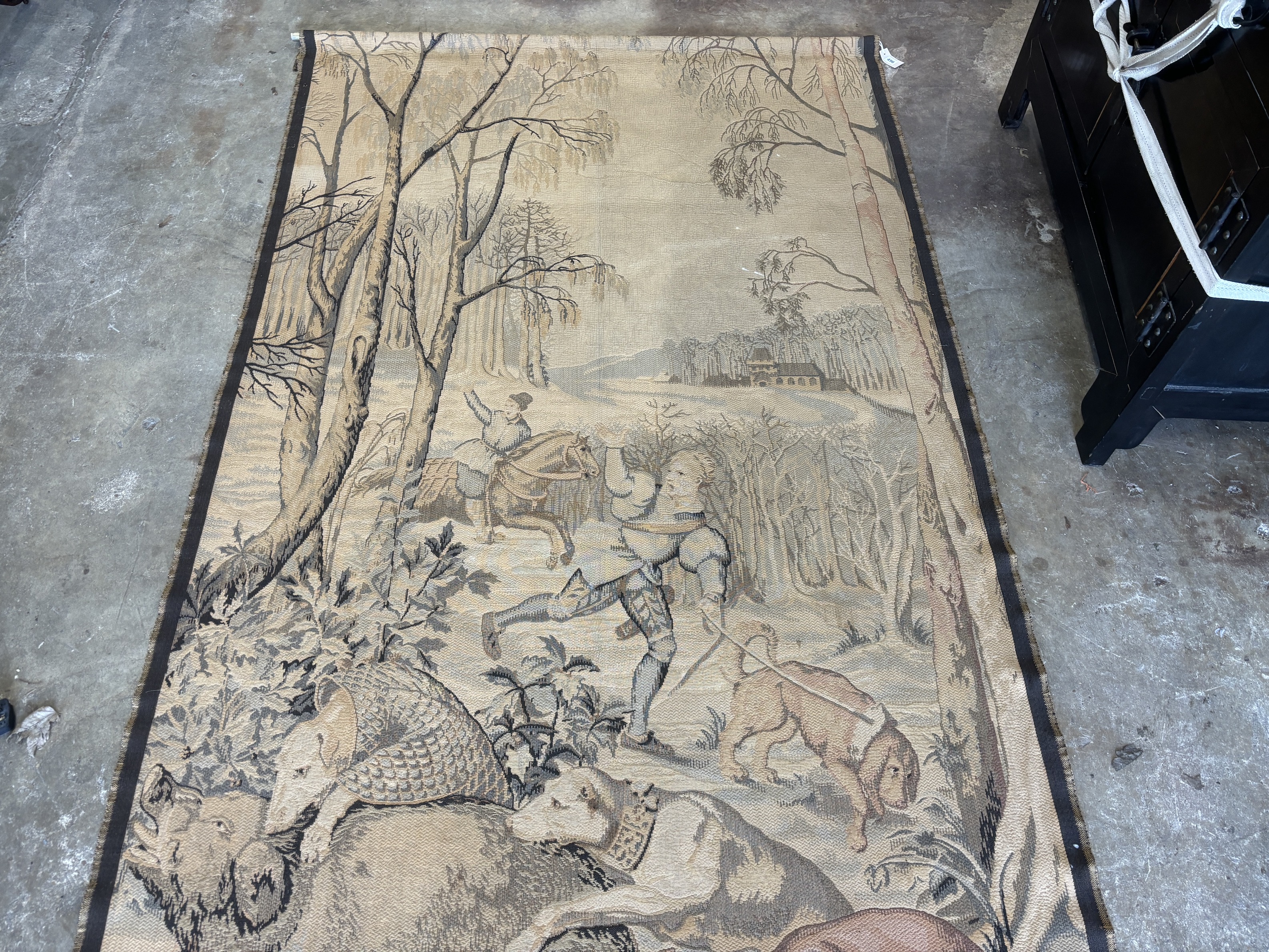A German machine tapestry of a hunting scene, 300cm high